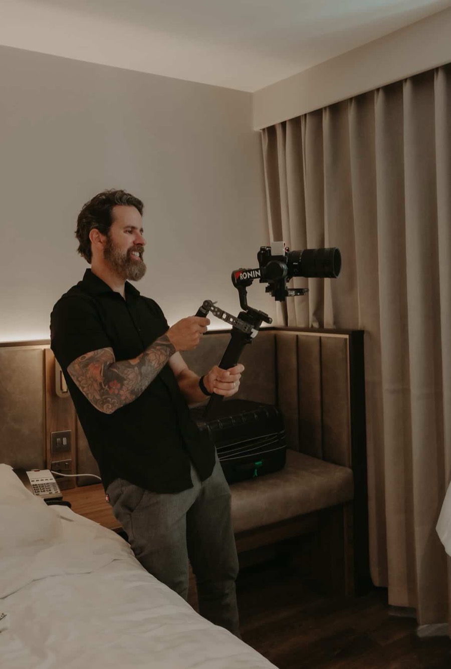 Leo Peres preparing a gimbal and camera setup during wedding coverage